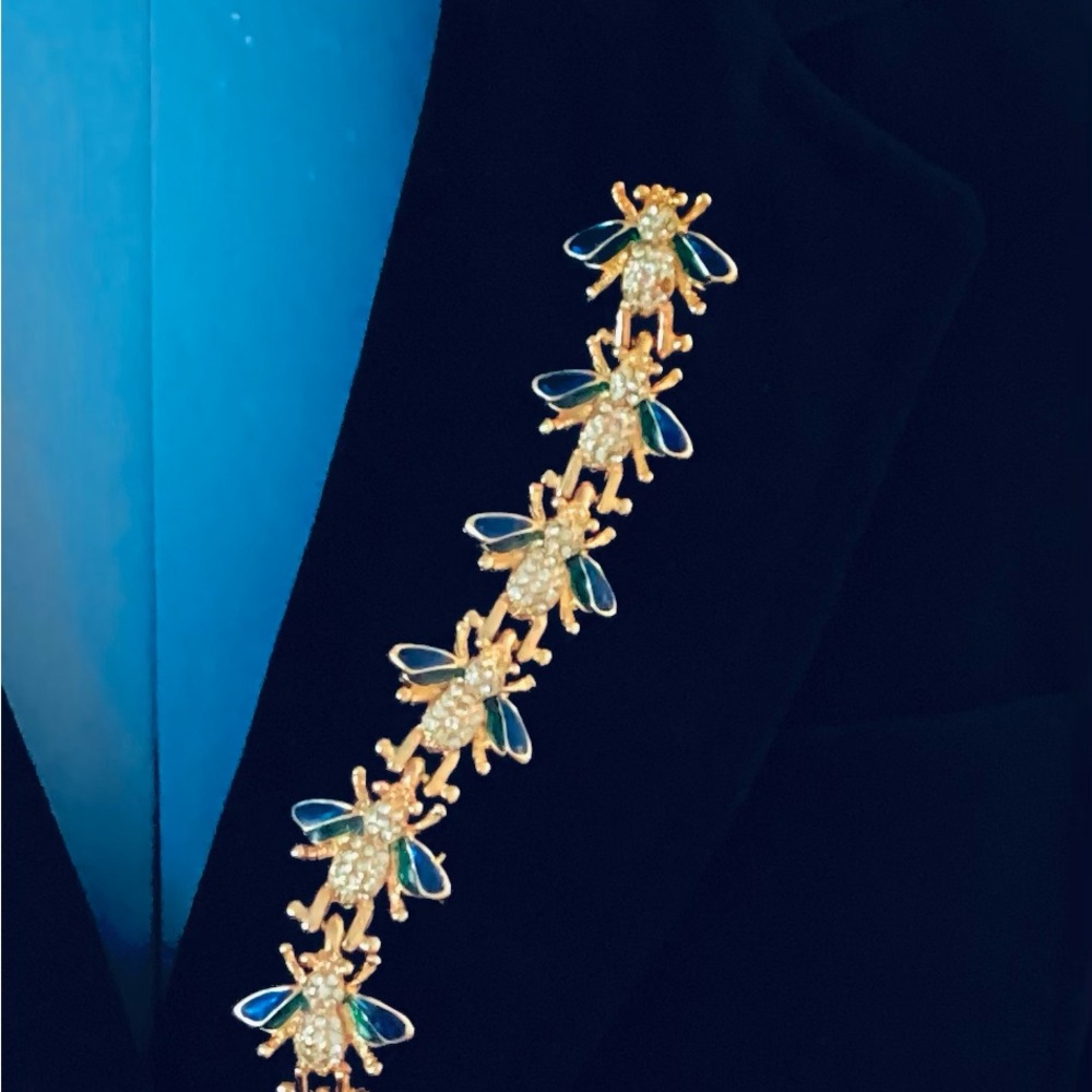 Seven bee, double pin rhinestone and enamel brooch.